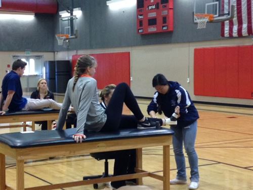 Students on massage tables